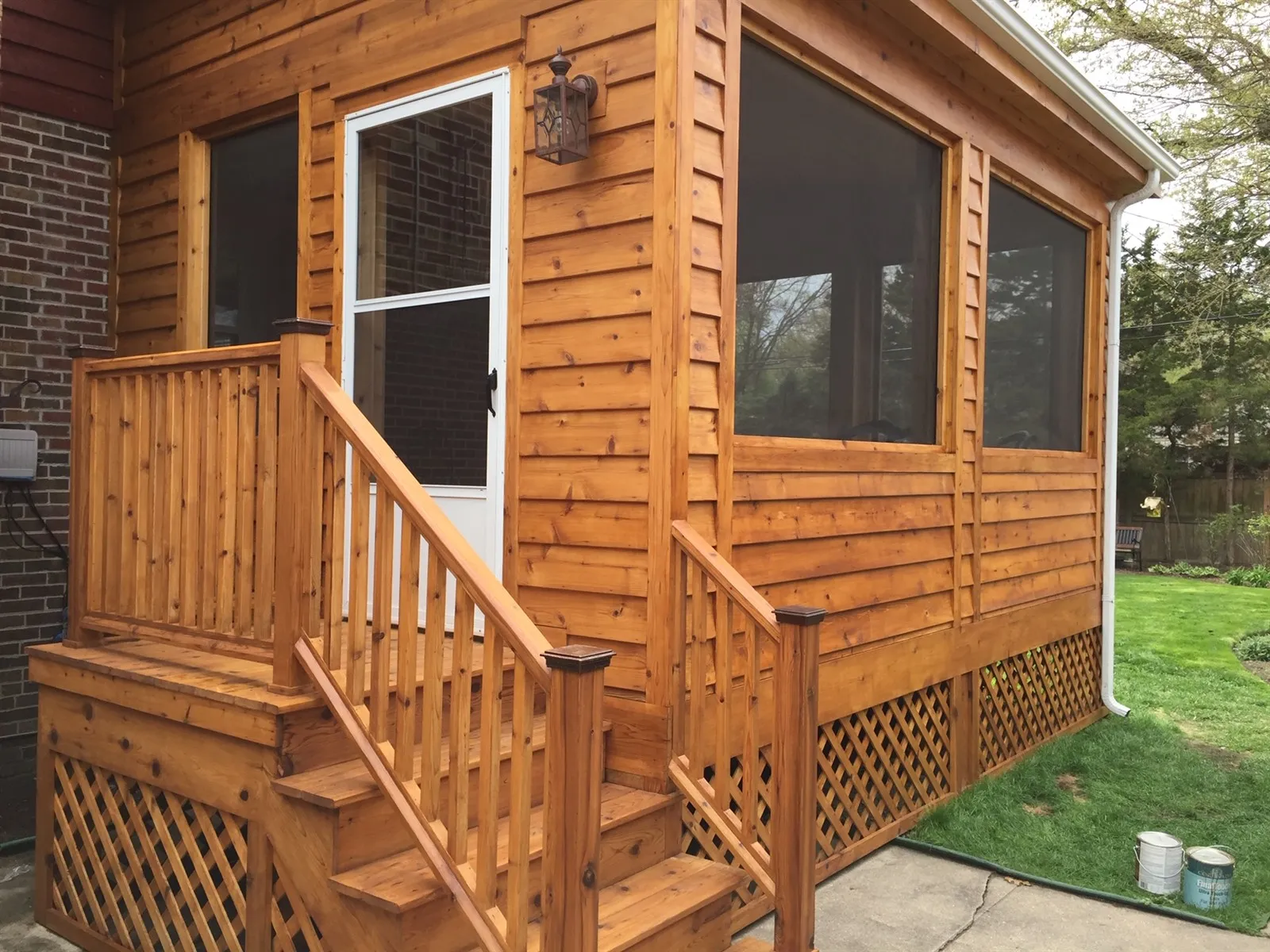 Cedar screened porch with new wood stairs