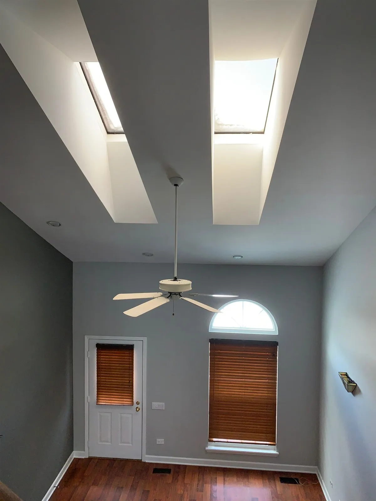 Finished room with skylights and ceiling fan