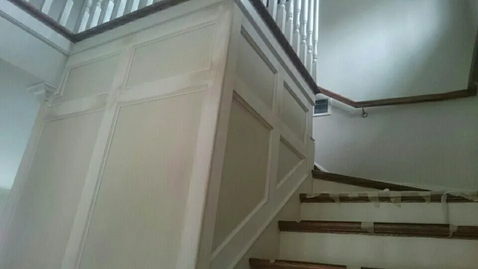 Staircase with new wall panels and trim